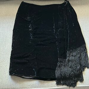 Bill Blass, Womans Size 10 Black Velvet feel mini skirt with side fringe.